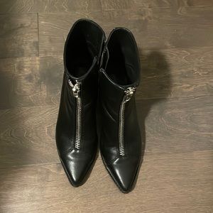 Black pointed toe booty with small heal